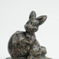 Multi-Material Squirrel Holding A Pine Cone Carving