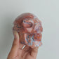 Hand Carved Petal Agate Skull For Decoration And Gift