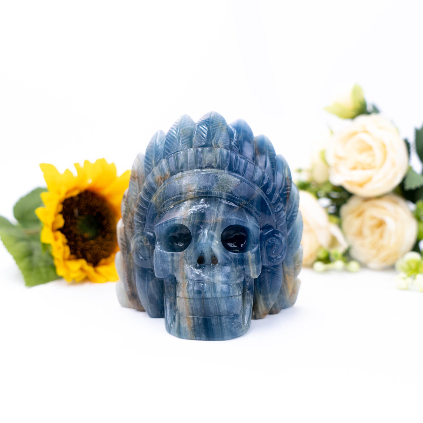 Natural Blue Onyx hand-carved wild man skull