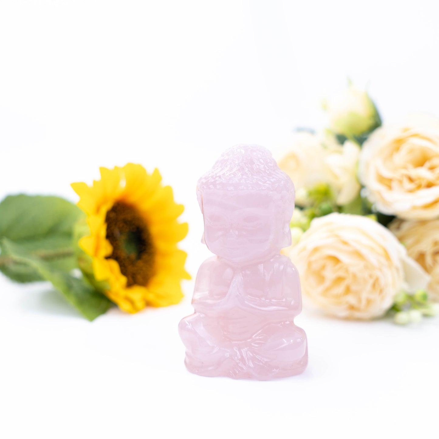 Natural rose quartz Hand Carved Buddha